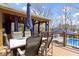 Relaxing outdoor dining and lounge space featuring a pool and wooden pavilion at 15385 Ellington Dr, Fishers, IN 46040