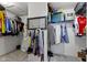 Walk-in closet with shelving and plentiful storage for clothing and accessories at 15385 Ellington Dr, Fishers, IN 46040