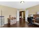 Functional home office with dark floors, double doors, and natural light at 15501 Landsbrook E Run, Noblesville, IN 46060