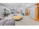 Basement game and seating area with a ping pong table and lounge area at 1583 E Osprey Dr, Greenfield, IN 46140