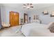 Bedroom features carpet, ceiling fan, and a large closet at 1583 E Osprey Dr, Greenfield, IN 46140