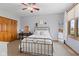 Bedroom with neutral colors, hardwood floors, and updated lighting at 1583 E Osprey Dr, Greenfield, IN 46140