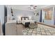 Serene bedroom with a mounted TV, geometric rug, and natural light at 1583 E Osprey Dr, Greenfield, IN 46140