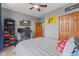 Comfortable bedroom with entertainment setup and Indiana Pacers banner at 1583 E Osprey Dr, Greenfield, IN 46140