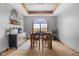 Formal dining area featuring a large window, modern light fixture and decor at 1583 E Osprey Dr, Greenfield, IN 46140