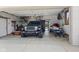 Spacious garage featuring parking for a car and jet ski at 1583 E Osprey Dr, Greenfield, IN 46140