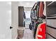 Spacious walk-in closet with ample shelving and clothing racks for organized storage at 1712 Rosette Way, Indianapolis, IN 46202