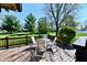 Inviting back deck offers outdoor seating and overlooks a spacious, well-manicured yard at 1927 Pheasant Way, Greenwood, IN 46143