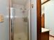 Bathroom showcasing a glass-enclosed shower stall and a vanity area with storage, designed for convenience and privacy at 1927 Pheasant Way, Greenwood, IN 46143