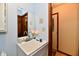 Compact bathroom featuring a single sink vanity and a large mirror at 1927 Pheasant Way, Greenwood, IN 46143