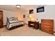Bedroom with a queen bed, desk, and dresser at 1927 Pheasant Way, Greenwood, IN 46143