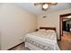 Comfortable bedroom with a neutral palette, a ceiling fan, and soft lighting for a serene feel at 1927 Pheasant Way, Greenwood, IN 46143