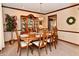 Formal dining room with elegant chandelier, china cabinet, and classic decor at 1927 Pheasant Way, Greenwood, IN 46143