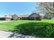 Charming single story home with brick and siding, manicured lawn and lovely shrubbery at 1927 Pheasant Way, Greenwood, IN 46143
