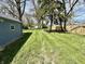 Spacious backyard with well-maintained lawn, providing ample outdoor recreational space at 1942 E Edgewood Ave, Indianapolis, IN 46227