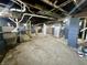 Spacious unfinished basement with exposed ductwork and supports, ready for customization at 1942 E Edgewood Ave, Indianapolis, IN 46227