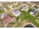 A serene backyard with lush greenery, a pond, and inviting patio space for outdoor enjoyment at 19510 Pathway Point, Noblesville, IN 46062