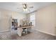 Bright bedroom featuring a ceiling fan, large window, a desk and a bookcase for storage and decor at 19510 Pathway Point, Noblesville, IN 46062