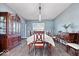 Formal dining room with traditional furniture, wood floors, and classic decor at 19510 Pathway Point, Noblesville, IN 46062