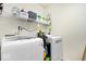 Laundry room with modern appliances and ample storage at 19510 Pathway Point, Noblesville, IN 46062