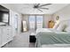 Spacious main bedroom features large windows, ceiling fan, and carpet at 19510 Pathway Point, Noblesville, IN 46062