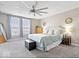 Main bedroom features large windows, ceiling fan, and neutral paint at 19510 Pathway Point, Noblesville, IN 46062