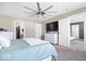 Spacious main bedroom boasts a view into the bonus room and closet at 19510 Pathway Point, Noblesville, IN 46062