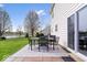 Enjoy outdoor dining on this patio with views of the backyard, and nearby pond at 19510 Pathway Point, Noblesville, IN 46062