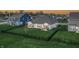 Aerial view of backyard with patio, grill, and large grassy area at 20515 Quicksilver Rd, Noblesville, IN 46062
