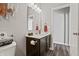 Well-lit bathroom with a modern vanity, sleek mirror, and neutral color palette, offering a serene and practical space at 20515 Quicksilver Rd, Noblesville, IN 46062