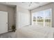 Bright bedroom featuring a window view, a ceiling fan, and a closet at 20515 Quicksilver Rd, Noblesville, IN 46062