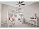 Charming bedroom featuring a loft bed with desk, creating a cozy and functional space for relaxation and study at 20515 Quicksilver Rd, Noblesville, IN 46062