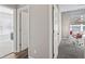 Bright hallway with doorways leading to rooms, showcasing the layout and flow of the home, offering seamless transitions at 20515 Quicksilver Rd, Noblesville, IN 46062