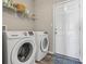 Functional laundry area equipped with modern Samsung washer and dryer, offering convenience and efficiency for daily chores at 20515 Quicksilver Rd, Noblesville, IN 46062