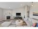 Relaxing living room with fireplace, TV, and comfy sectional sofa perfect for Gathering time and entertaining at 20515 Quicksilver Rd, Noblesville, IN 46062