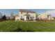 Well-maintained backyard featuring a deck, patio, and a beautifully landscaped garden, ideal for relaxation and entertainment at 2093 Autumn Faith Way, Avon, IN 46123