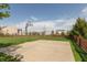Backyard concrete basketball court and hoop with fencing and landscaping at 2093 Autumn Faith Way, Avon, IN 46123