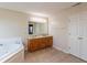 Bathroom with double sinks, a soaking tub, and a separate shower, offering a spa-like experience at 2093 Autumn Faith Way, Avon, IN 46123
