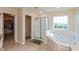 Bright bathroom features a soaking tub, separate shower, and access to a walk-in closet for convenience at 2093 Autumn Faith Way, Avon, IN 46123