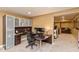 Functional home office featuring built-in cabinets and a desk area for a workspace at 2093 Autumn Faith Way, Avon, IN 46123