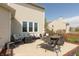 Outdoor patio with lounge seating, dining table, and backyard views perfect for enjoying leisure at 2093 Autumn Faith Way, Avon, IN 46123