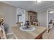Classic dining room featuring a wooden table set and a charming wooden china cabinet at 213 N Walnut St, Edinburgh, IN 46124