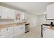 Well-lit kitchen with butcher block countertops, subway tile backsplash, and stainless steel dishwasher at 217 Eikenberry St, Greenfield, IN 46140