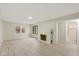 Spacious living room showcasing a decorative fireplace and ample natural light at 217 Eikenberry St, Greenfield, IN 46140