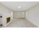 Bright living room with fireplace, built-in shelving, and natural light at 217 Eikenberry St, Greenfield, IN 46140