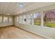 Bright and airy sunroom with an abundance of windows at 217 Eikenberry St, Greenfield, IN 46140