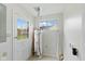 Bright utility room with a newer hot water heater at 217 Eikenberry St, Greenfield, IN 46140