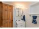 Cozy, well-lit bathroom with a sink, a medicine cabinet, and a decorative accent towel at 218 Miami Dr, Noblesville, IN 46062