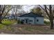 Cozy home with inviting entrance, cute porch, and well-manicured front yard at 218 Miami Dr, Noblesville, IN 46062