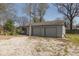 Spacious two-car detached garage with gravel driveway and convenient access at 218 Miami Dr, Noblesville, IN 46062